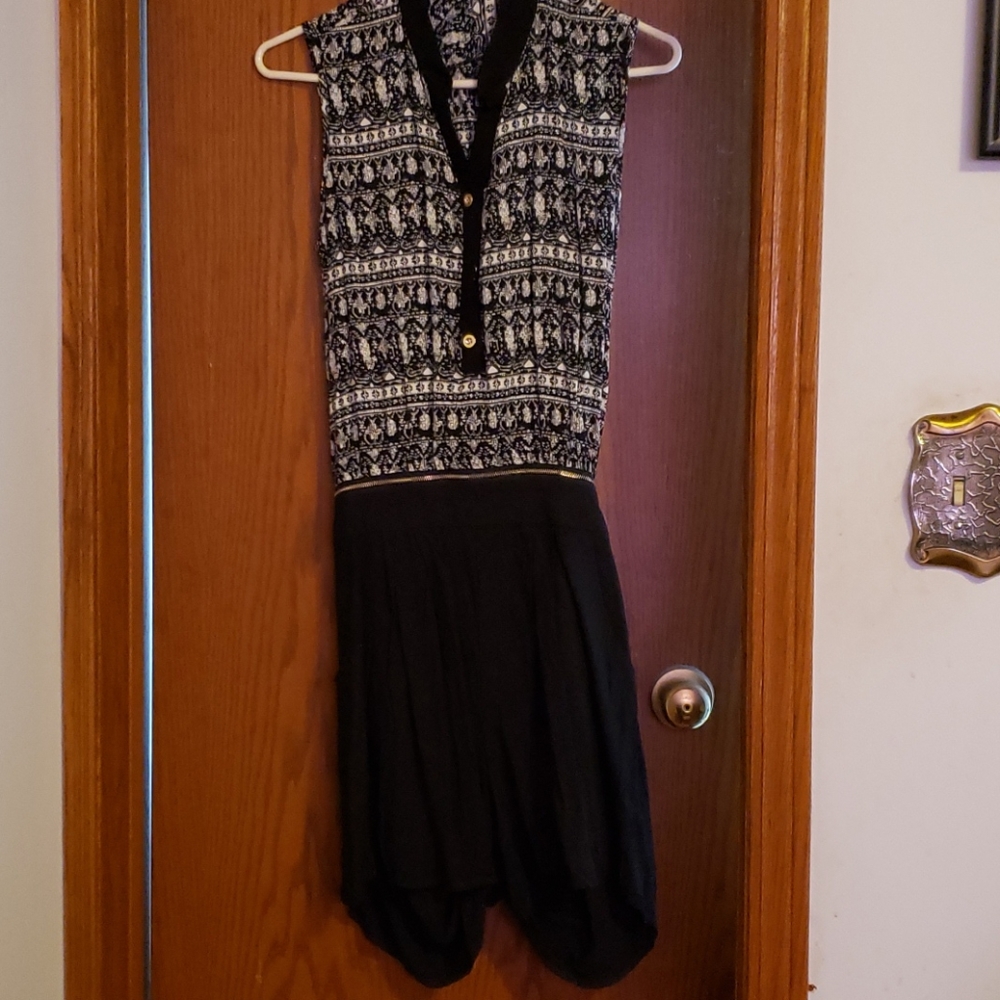 Sale  3 for $40 Romper with open back.  S/M size